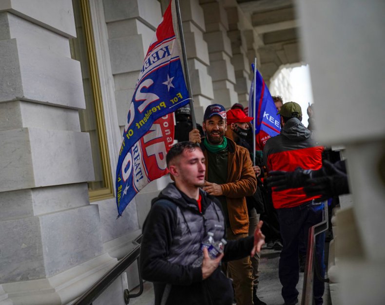 Chicago Cop Charged in Capitol Riot Allegedly Used N-Word,
'Commie' in Text Message 1