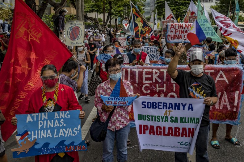 China's 'Outrageous' South China Sea Moves Slammed in
Philippines Independence Day Protests 1