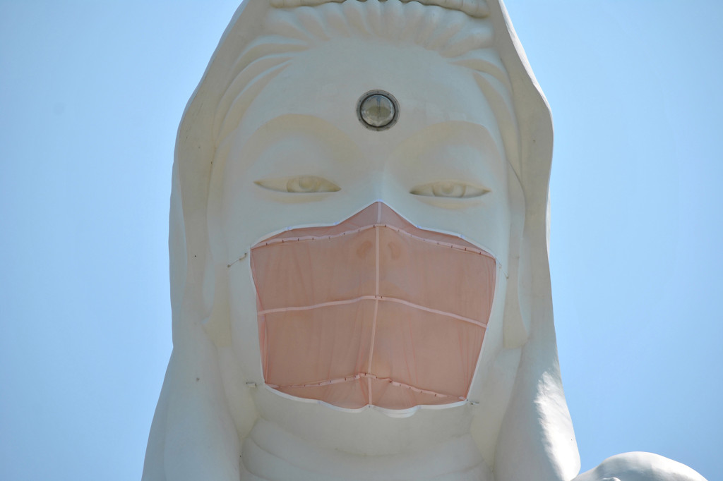 Giant Buddhist goddess in Japan gets face mask to pray for
end of COVID-19 1