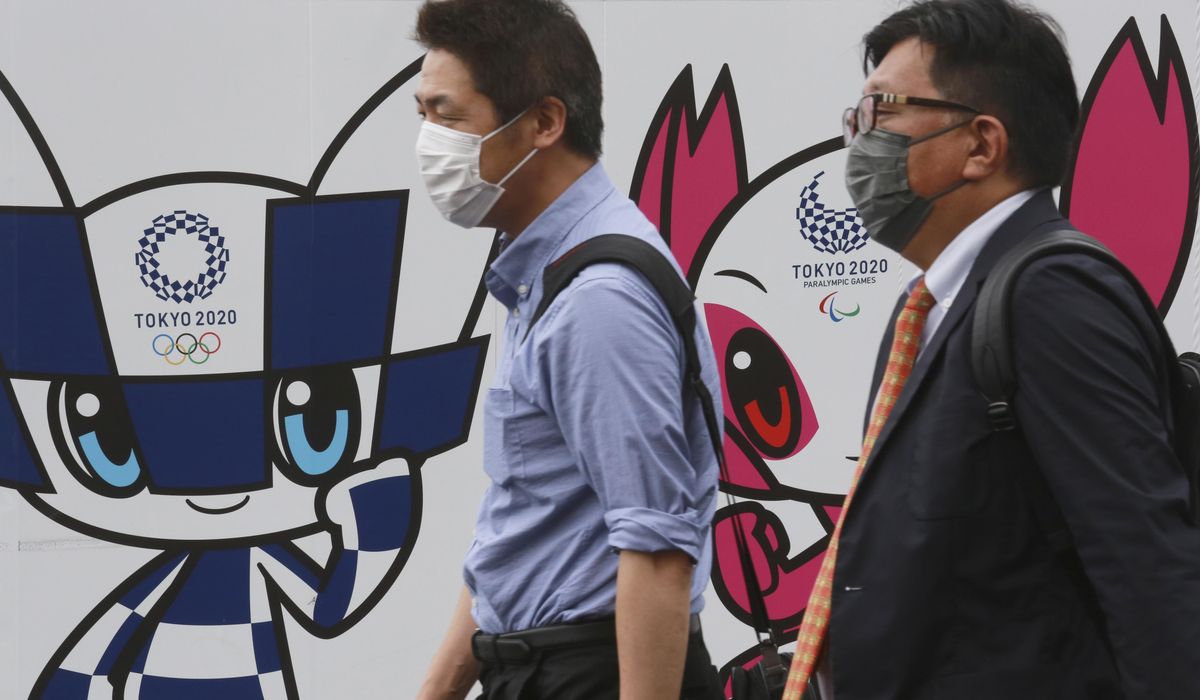 Japan announces easing of coronavirus state of emergency
ahead of Olympics 1