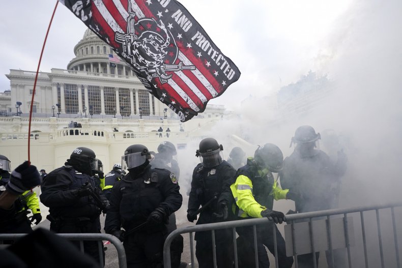 Ex-GOP Rep. Riggleman Says Lawmakers Should Shake Cop's Hand
as Capitol Rioter Clips Emerge 1