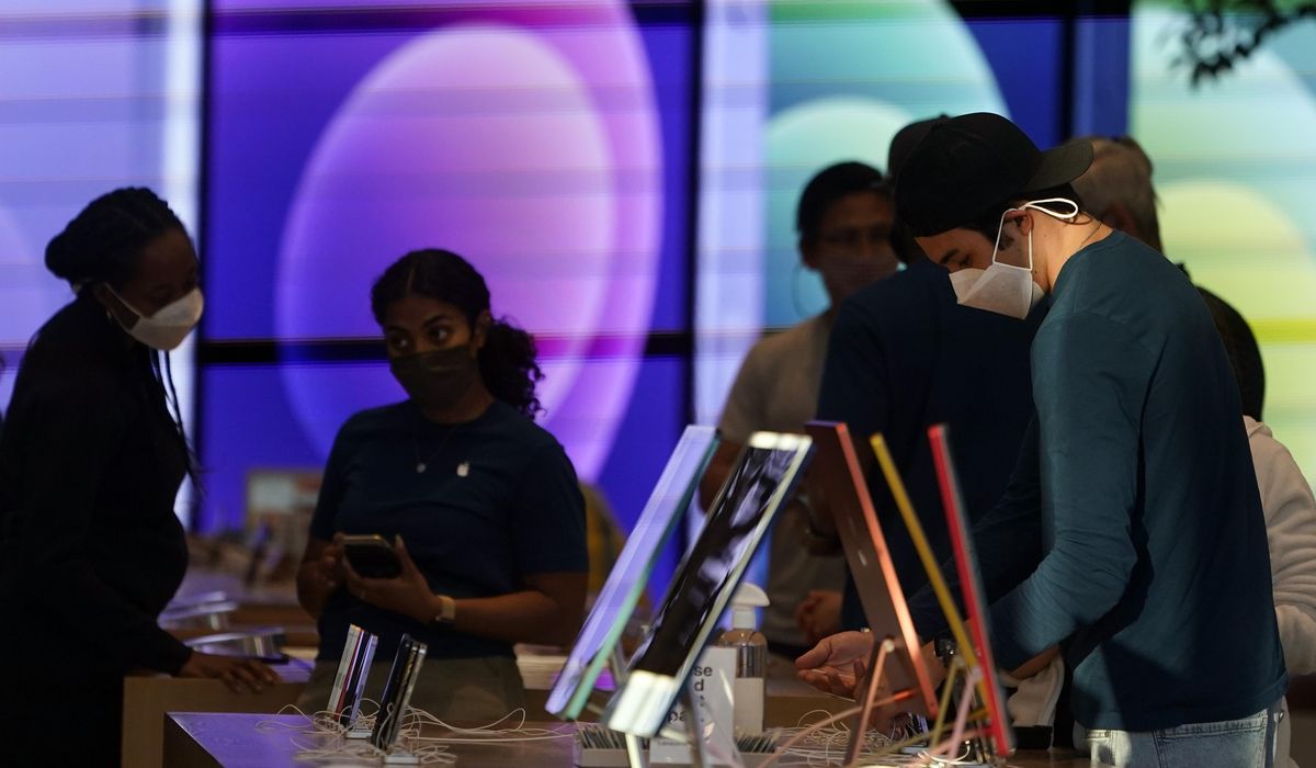California drops workplace mask rule for vaccinated
workers 1