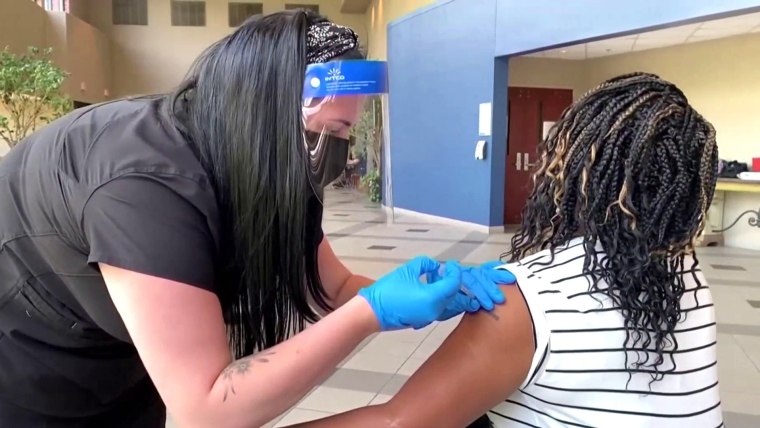 Biden administration to recommend the vaccinated wear masks
in some areas 1