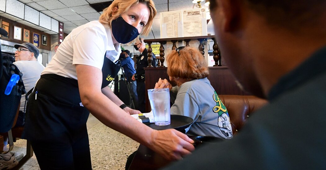 Haunted by Past Virus Surges, California Leans on Masks and
Vaccines 1