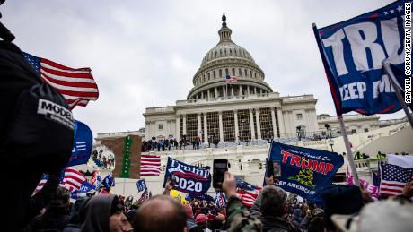 US Capitol rioter sentencing delayed after online sleuths
uncover new footage of alleged police assault 1