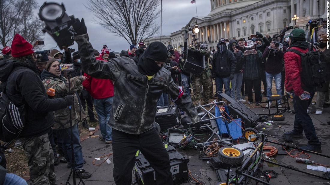 Capitol rioters smashing media equipment prompt several new
criminal cases 1