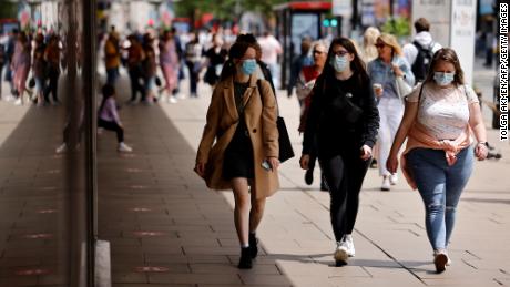 Face masks will be a 'personal choice' in England, says UK
minister 1