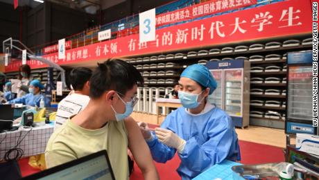 Unvaccinated people in parts of China to be denied access to
hospitals, parks and schools 1