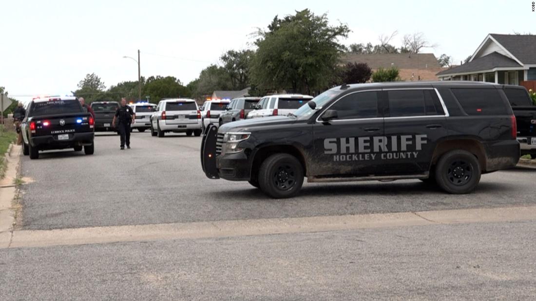 An officer is killed and 3 others wounded during a standoff
in a Texas town 1