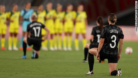 Women's soccer teams take a knee ahead of opening Olympic
Games matches 1