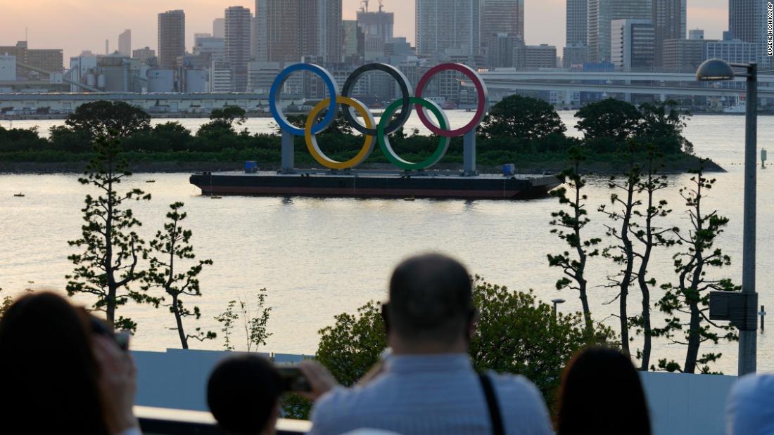 Tokyo adds record number of new Covid-19 cases amid Olympic
Games 1