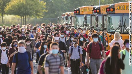 How does the new CDC mask guidance change how families stay
safe from Covid-19? An expert's take 1