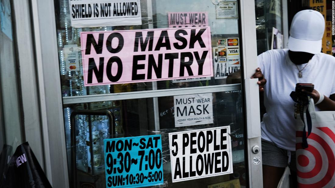 Fact-checking Biden's claim on mask mandates and vaccination
rates 1