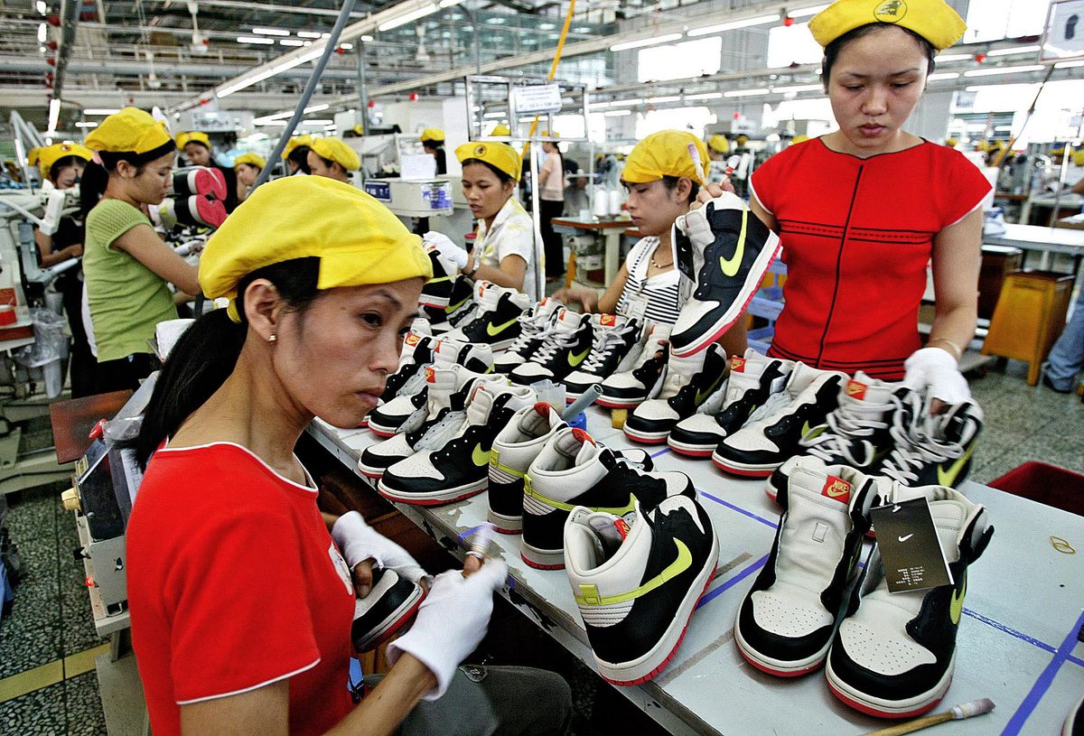 COVID-19 spread at Vietnam Nike suppliers halts
production 1 COVID-19 spread at Vietnam Nike suppliers halts
production 1