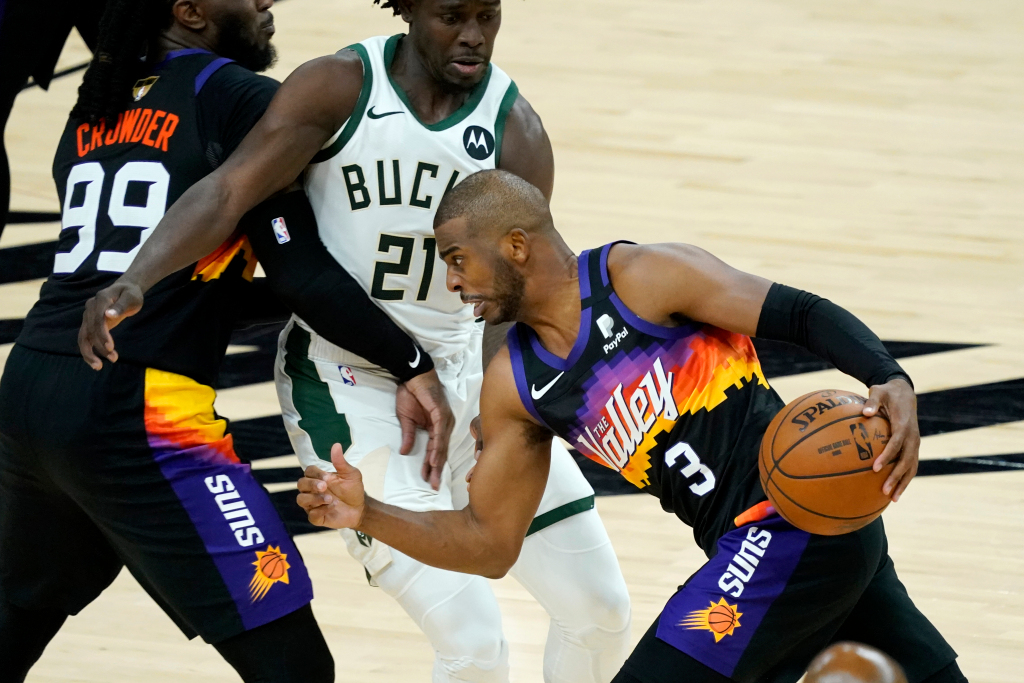 Chris Paul carries Suns past Giannis Antetokounmpo, Bucks in
NBA Finals opener 1