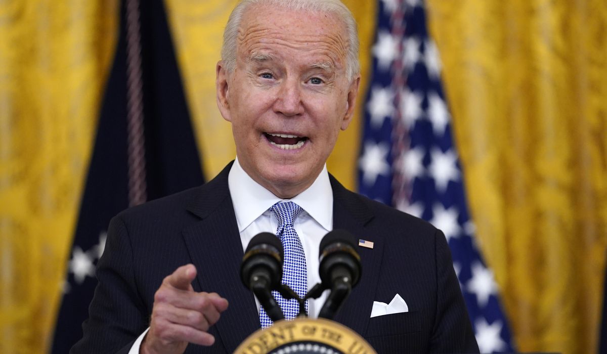 Joe Biden orders federal workers to get vaccinated or face
testing, masks 1