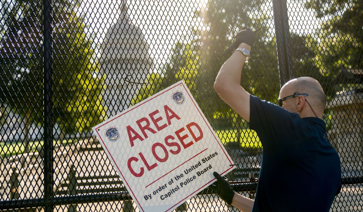 Capitol fencing coming down six months after Jan. 6
riot 1