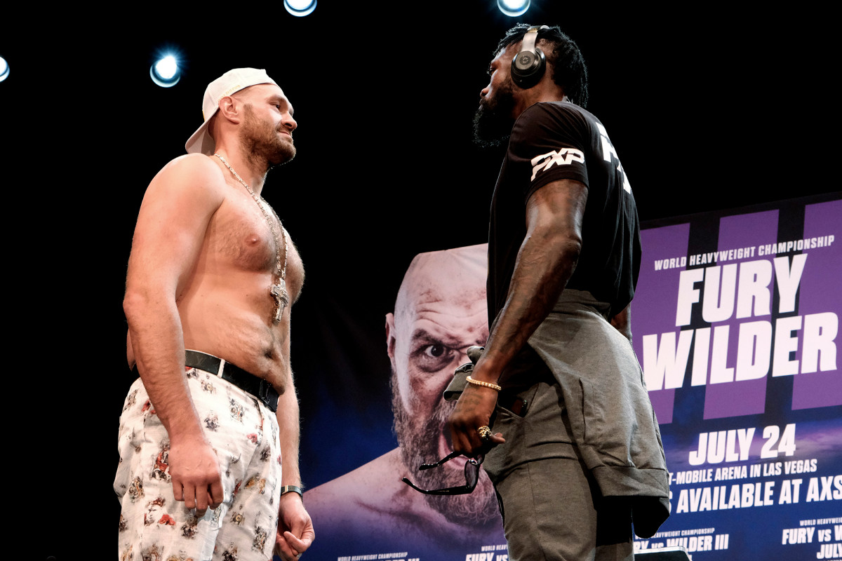 Tyson Fury testing positive for COVID-19 postpones Deontay
Wilder fight 1