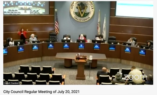 California councilwoman, masked man arrested during chaotic
city meeting 1