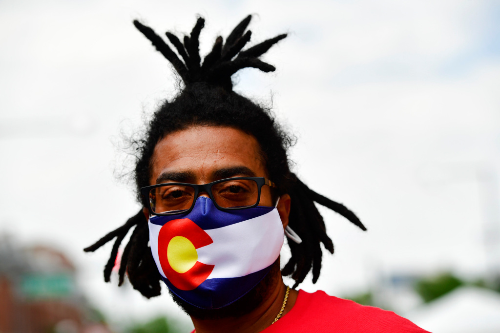 Colorado stays course as mask policies are revisited amid
rapid spread of delta variant 1