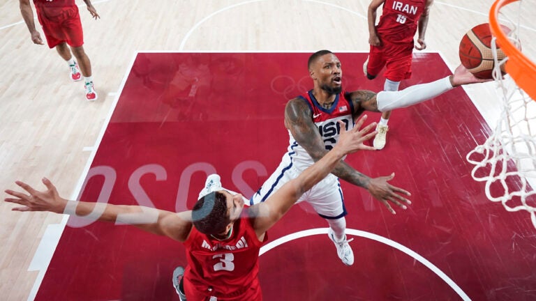 US bounces back from Olympic-opening loss, routs Iran
120-66 1