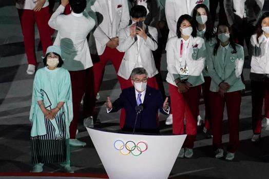 The Latest: Osaka lights cauldron at Tokyo opening
ceremony 1