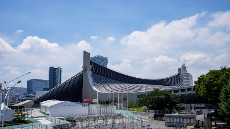 As Tokyo Games open, can Olympic flame burn away the
funk? 1