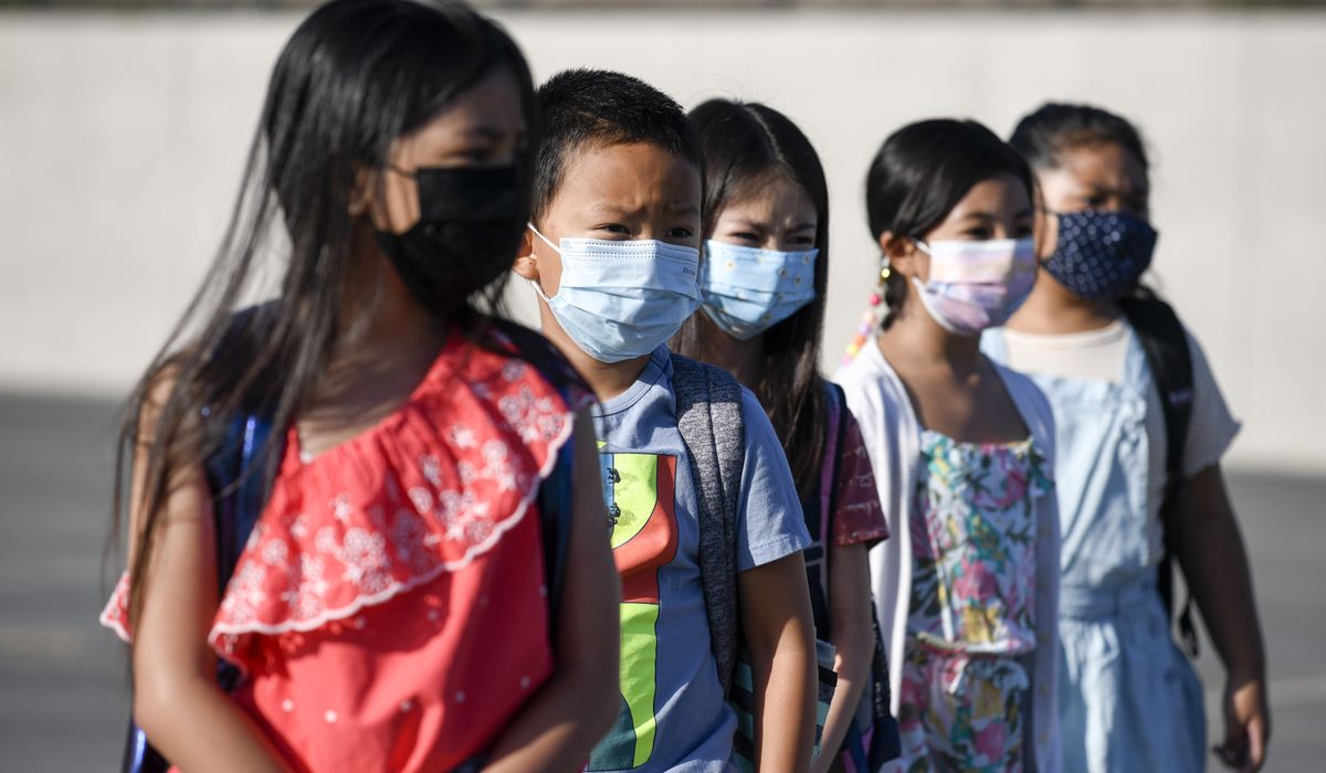Virginia officials recommend schools require face
masks 1