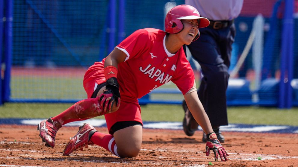 Japan tops Australia in softball as delayed Tokyo Games
open 1