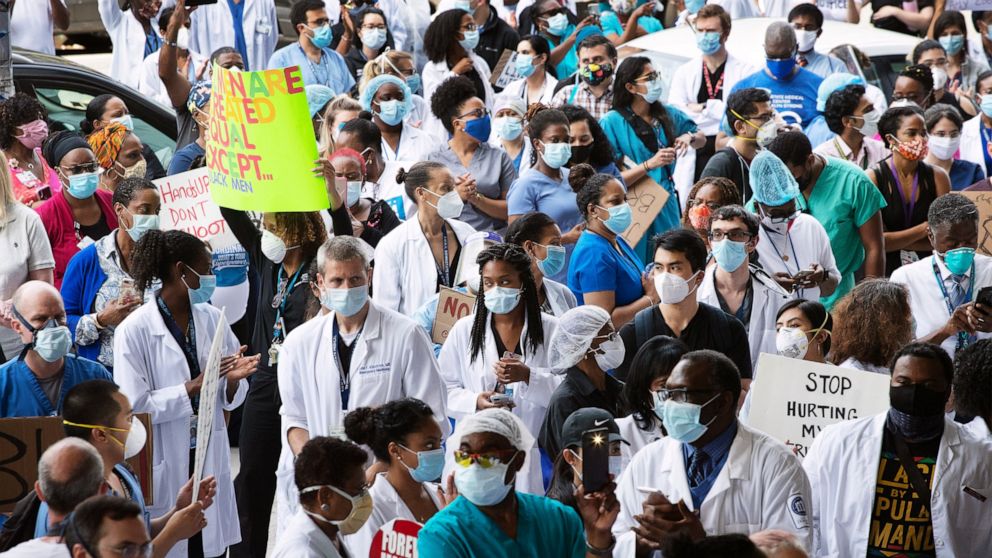 COVID-19 cases in US triple over 2 weeks amid
misinformation 1
