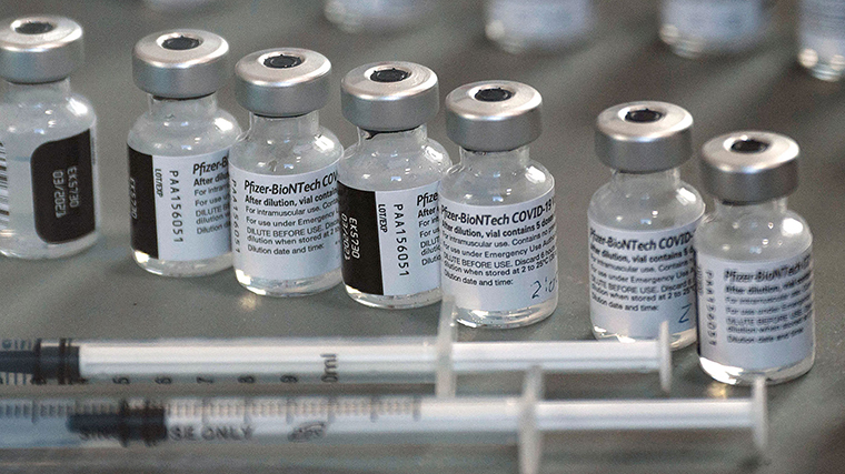 Kansas governor says state employees must wear masks indoors
regardless of vaccination status 1