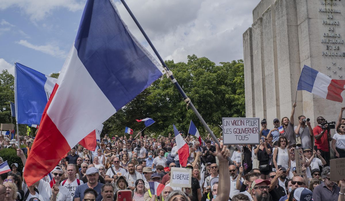 French protesters reject virus passes, vaccine
mandate 1