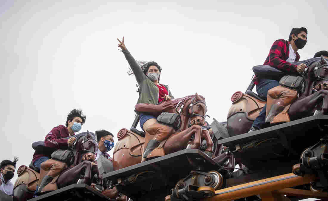 Coronavirus FAQ: I'm Vaccinated. I Thought I Could Give Up
Masks! But ... Should I? 1