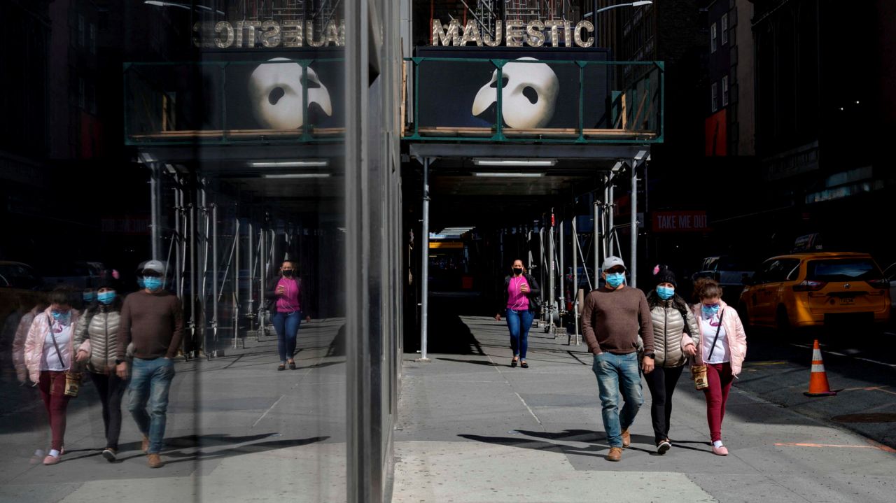 Broadway will require patrons to mask up and provide proof
of vaccination 1