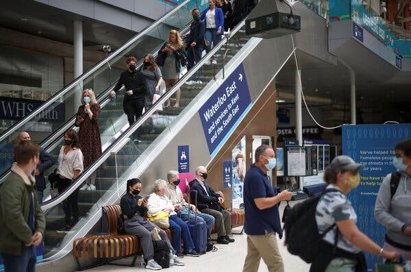 England to Lift Most Virus Restrictions, Including Those for
Masks 1