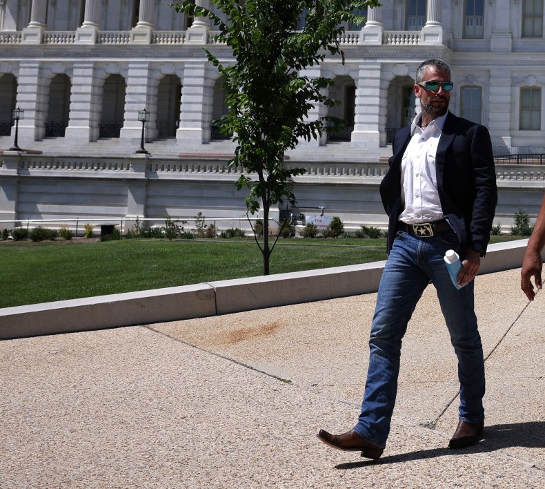 Capitol Rioter Thomas Sibick Seen Taking Injured Officer's
Badge in New Bodycam Video 1