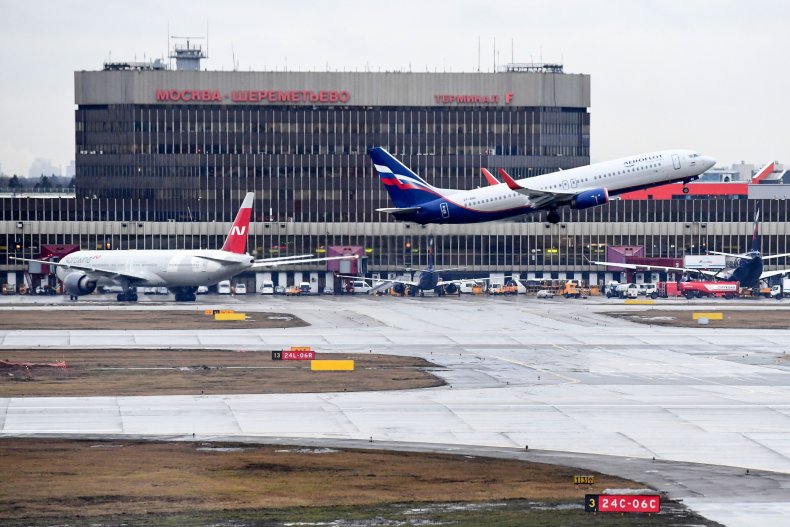 Passenger Opens Plane's Emergency Exit Door To Get Fresh
Air 1