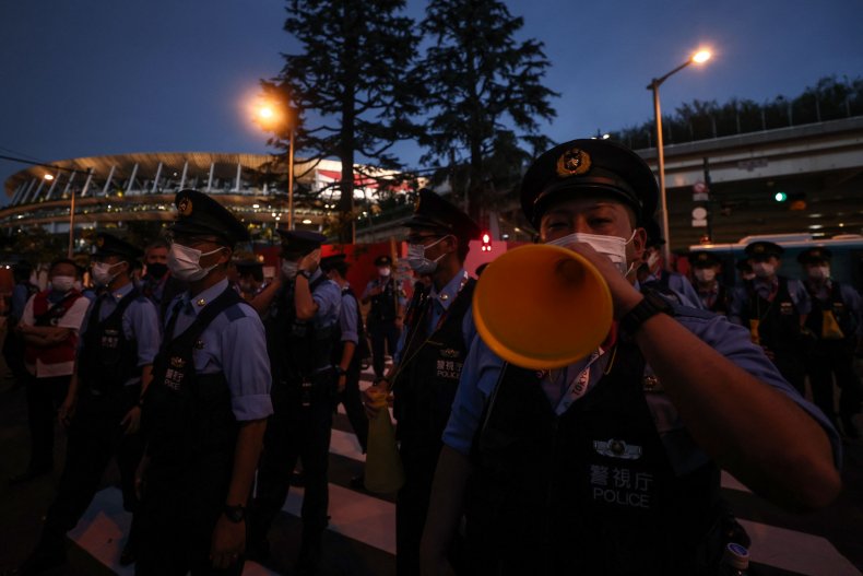 Protest in Tokyo Minutes Before Olympics Opening
Ceremony 1