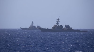 Biden Keeps Up Monthly U.S. Navy Warship Patrols in Taiwan
Strait Amid China Protests 1