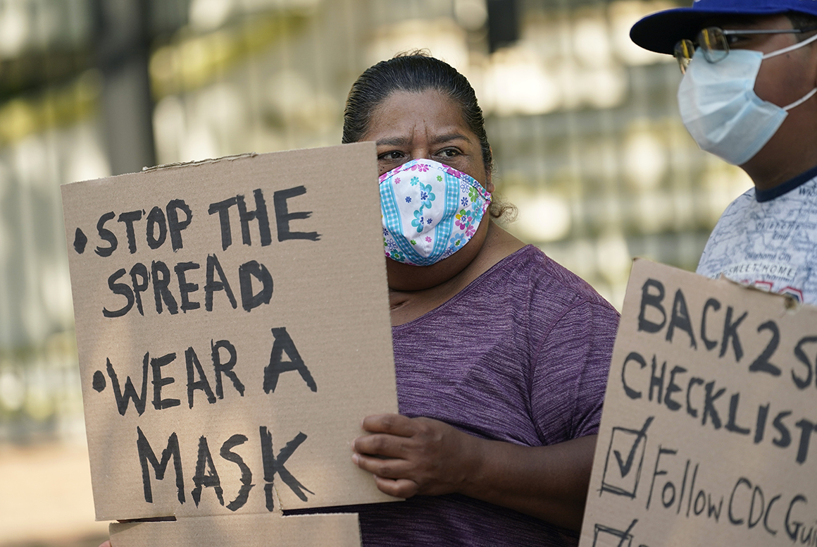 GOP governors embrace Covid cocktails over masks as cases
surge 1