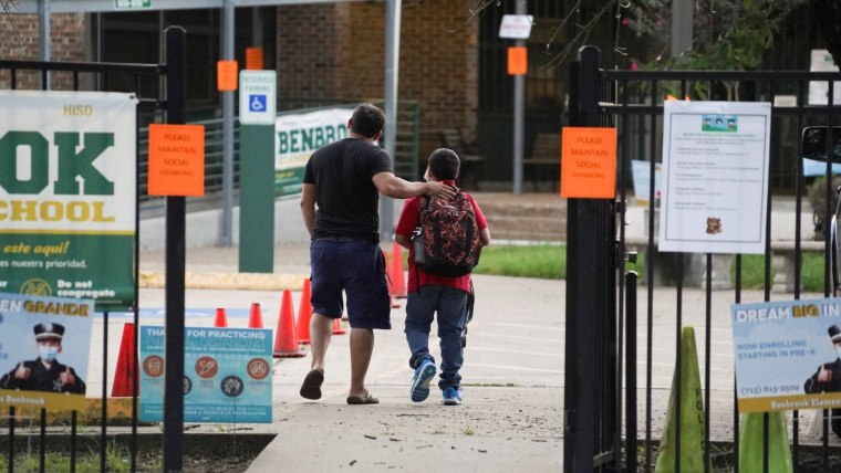 Feds to investigate whether 5 states that ban mask mandates
are violating student rights 1