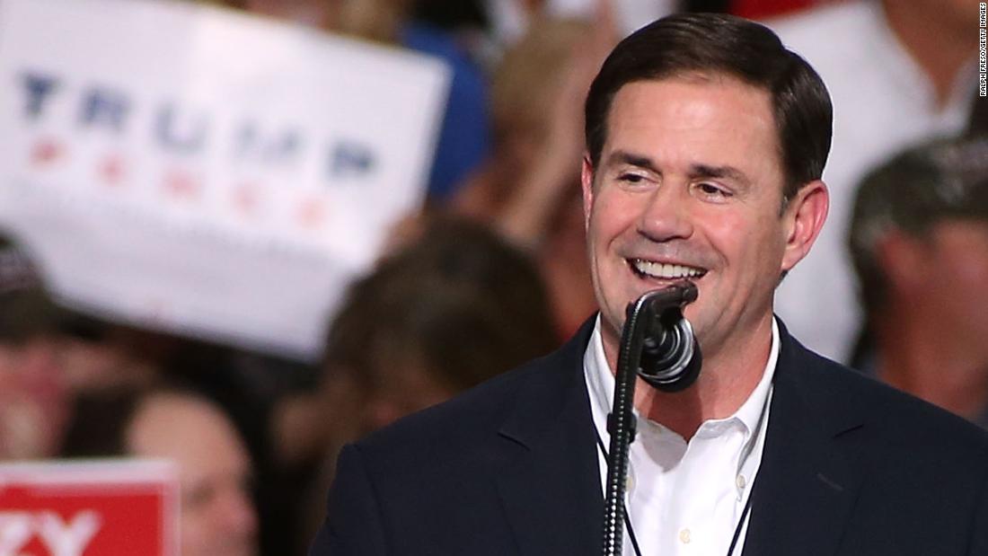 Arizona governor to exclude school districts with mask
mandates from new education grants 1