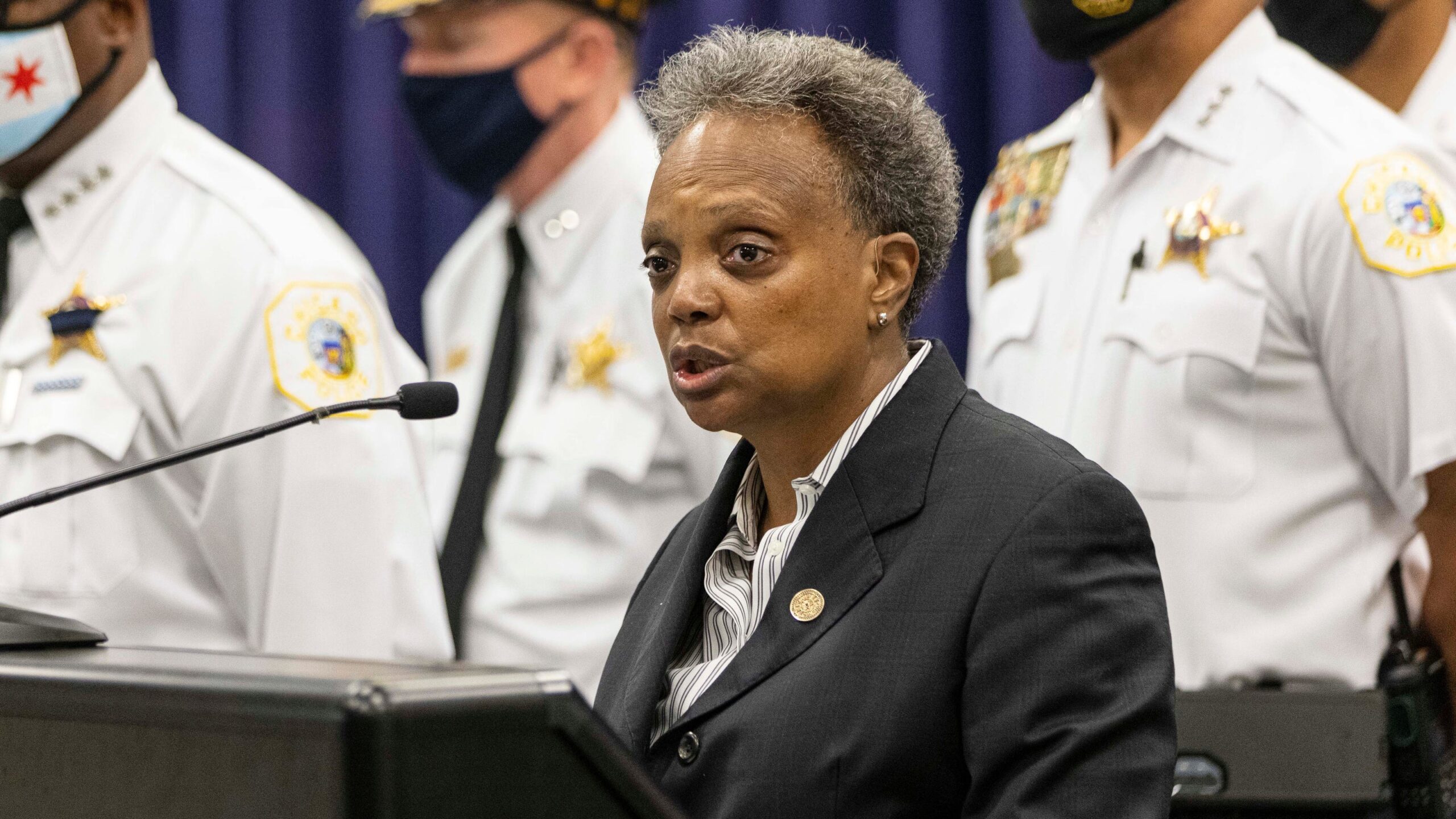 'Our hearts ache': 2 brothers charged in fatal shooting of
Chicago police officer at traffic stop 1