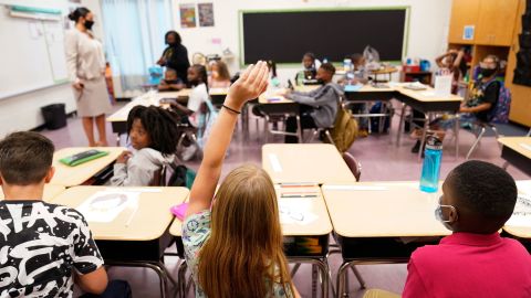 Officials split on masking up children in schools as
pediatric hospitals fill up with Covid-19 patients 1