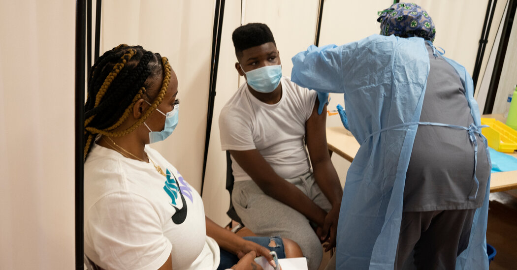F.D.A. Fully Approves Pfizer-BioNTech’s Vaccine, a First for
a Covid-19 Shot 1