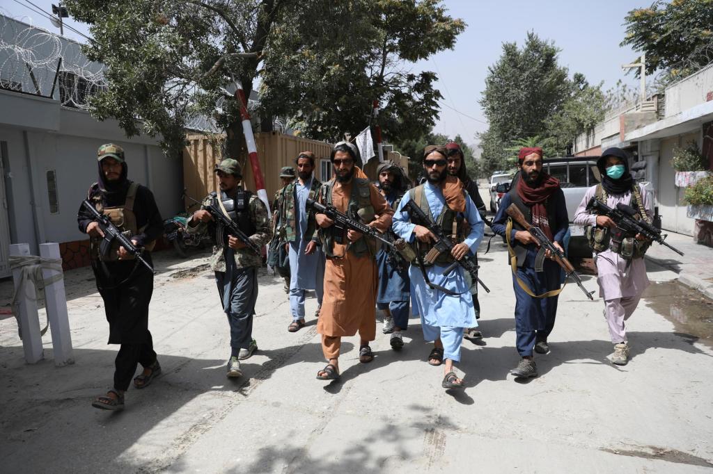 Taliban violently disperse rare protest, killing 1
person 1
