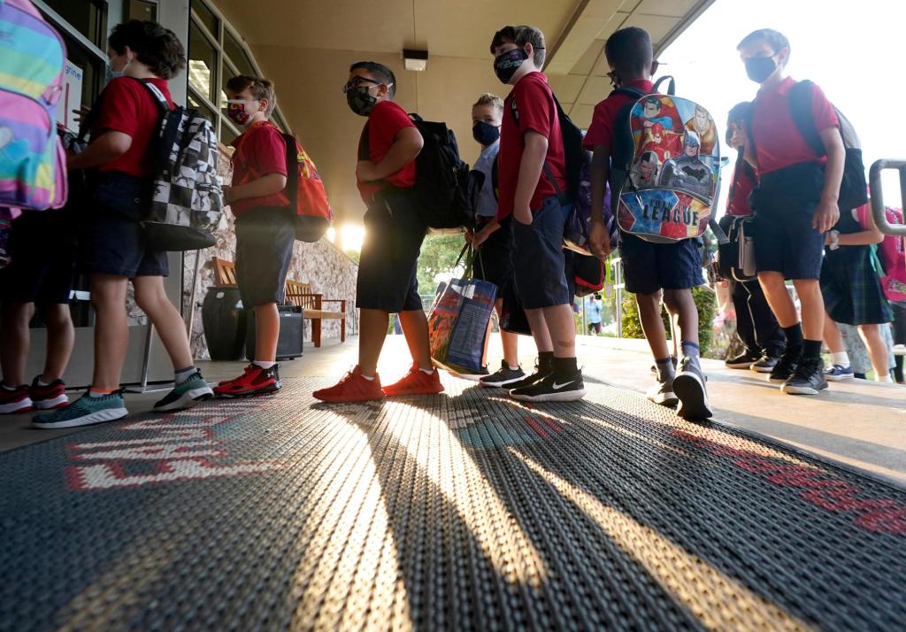School mask mandates, vaccine requirements supported in
U.S., AP-NORC poll finds 1