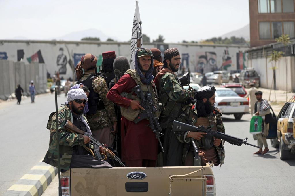 Afghans protest Taliban in emerging challenge to their
rule 1