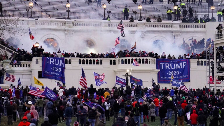 A Capitol riot suspect was hours away from sentencing. Then
prosecutors received video of an assault on police. 1