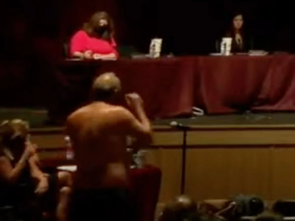 Texas man strips down to his swim trunks to make a point
about masks in school 1 Texas man strips down to his swim trunks to make a point
about masks in school 1